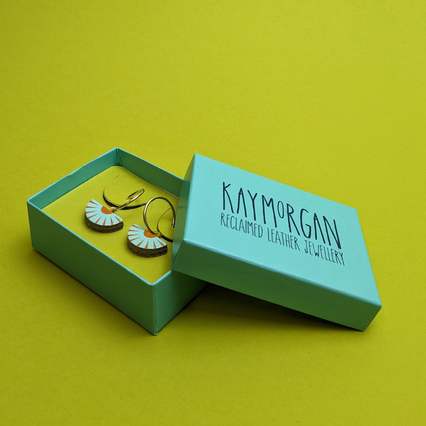 HOOP EARRING WITH CHARM