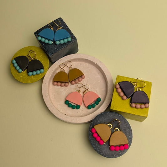 A collection of beaded leather earrings in lovely colour combinations made Kay Morgan in Bristol.