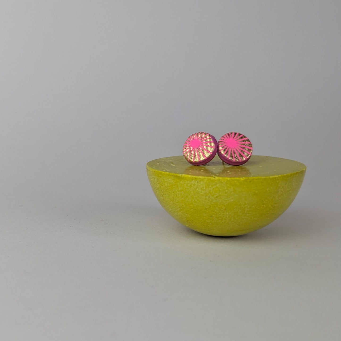 Patterned small circle studs.